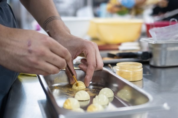 Student making chocolates